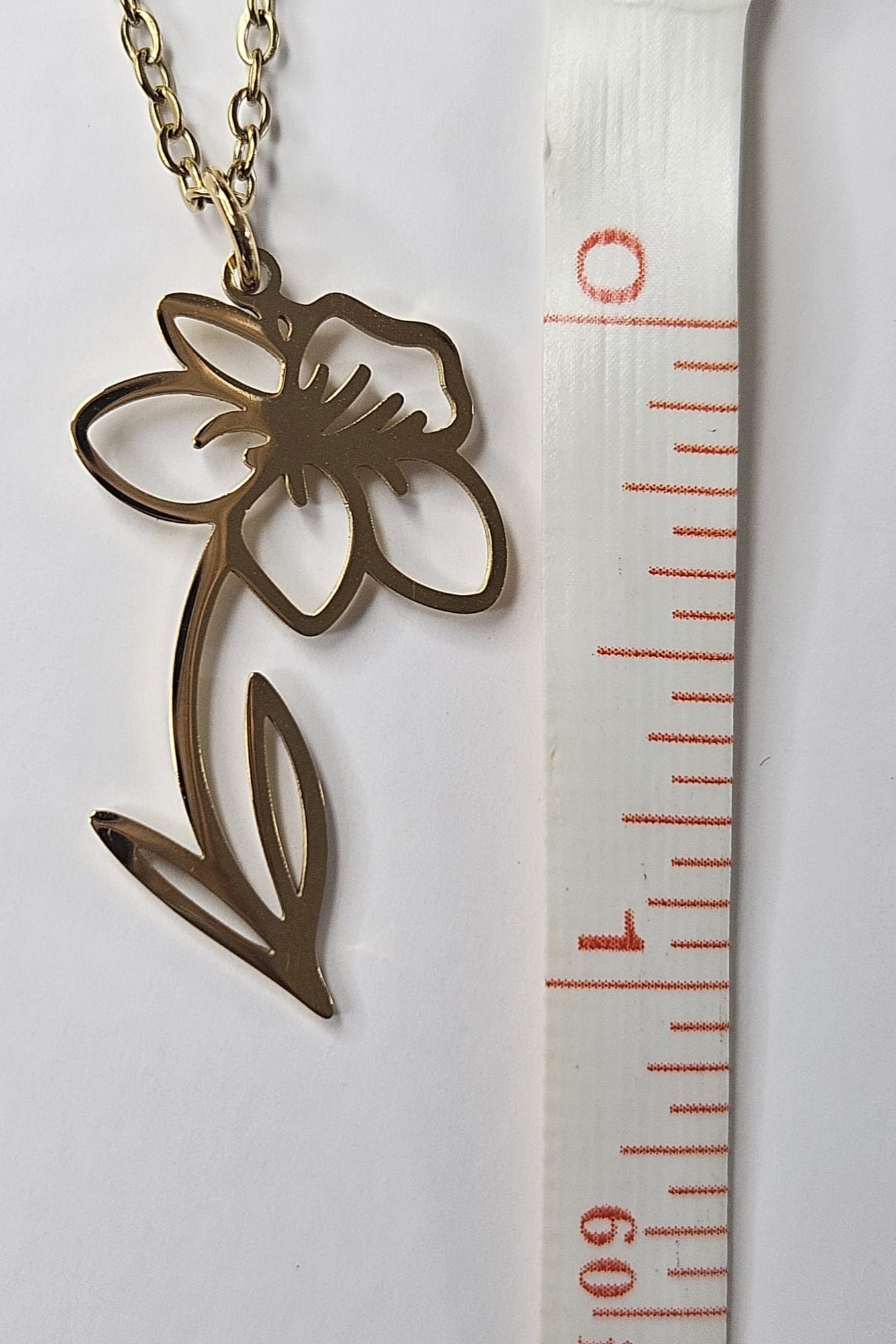 CADENA DORADA CON PENDANT DE FLOR