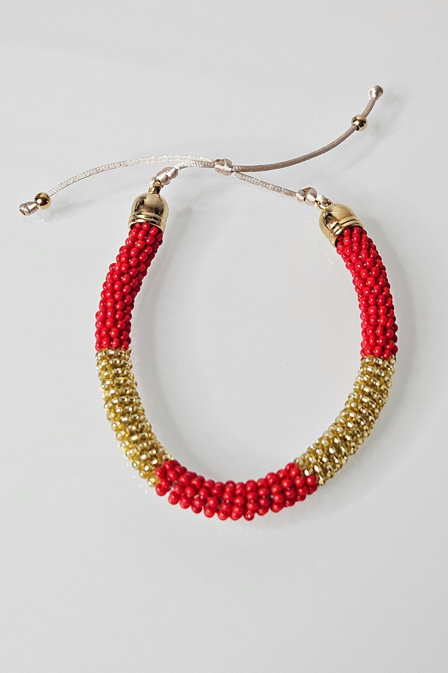 SET DE PULSERA AJUSTABLE Y PANTALLAS ROJO Y DORADO