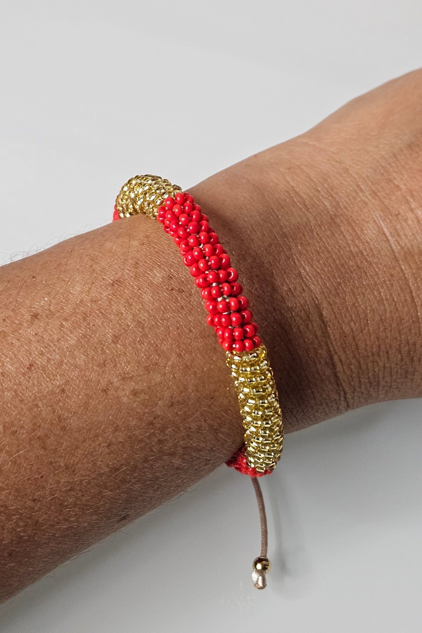 SET DE PULSERA AJUSTABLE Y PANTALLAS ROJO Y DORADO