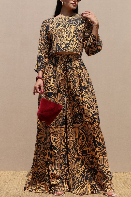 SET DE BLUSA Y PANTALÓN ESTAMPADO NEGRO MOSTAZA