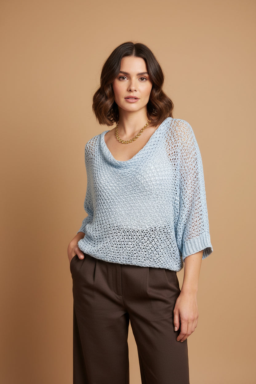 BLUSA TEJIDA CON NUDO AZUL CIELO