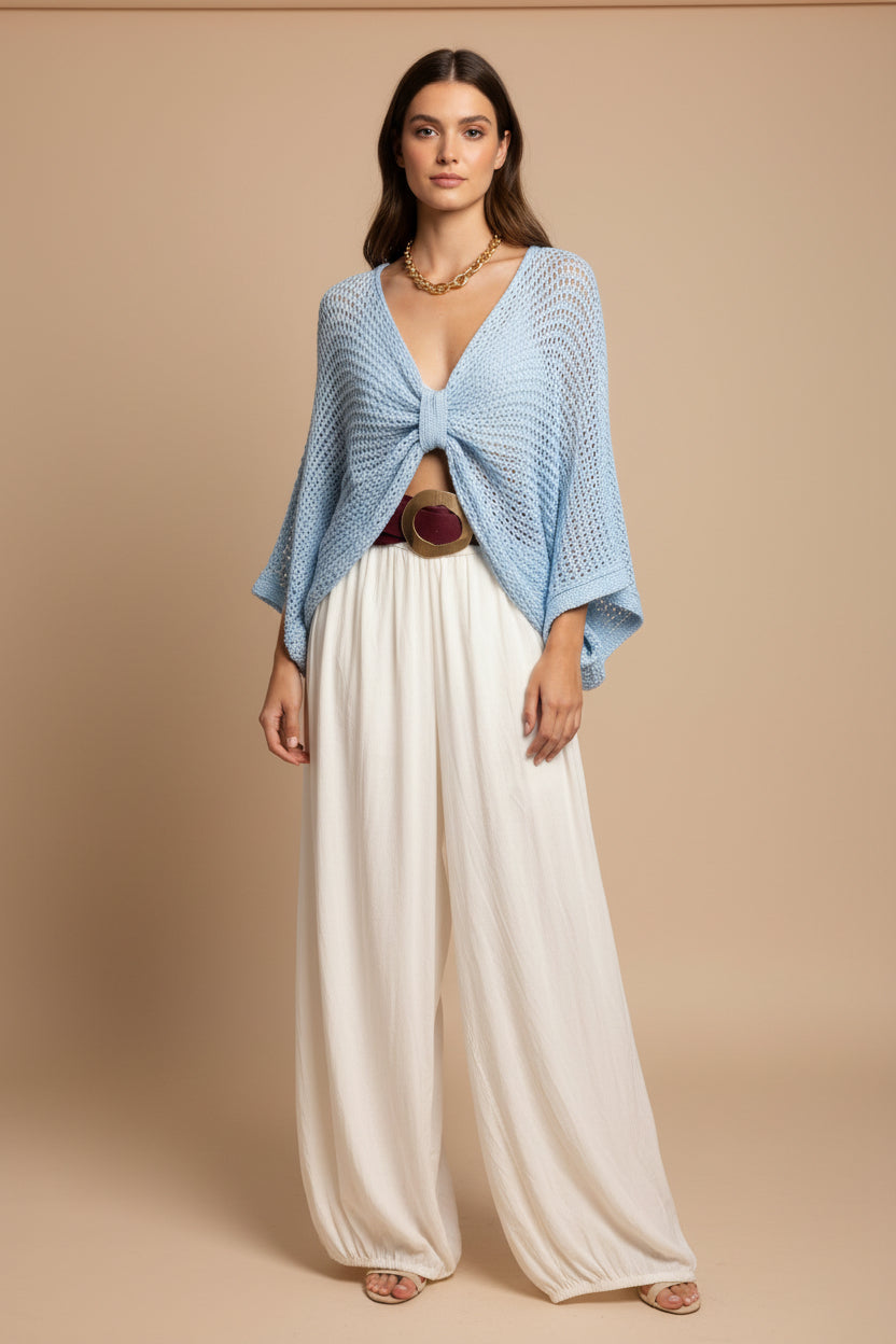 BLUSA TEJIDA CON NUDO AZUL CIELO