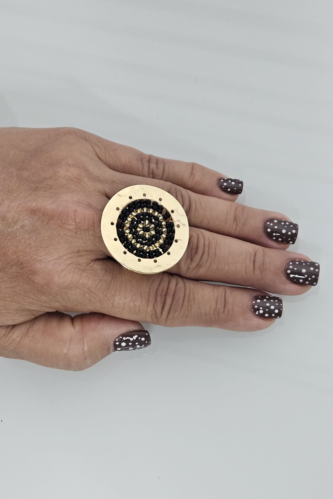 SORTIJA DORADA CON NEGRO