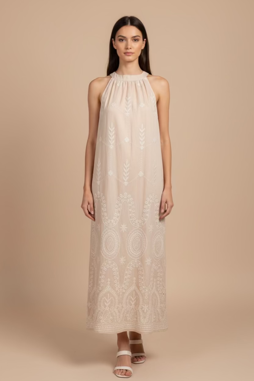 TRAJE SIN MANGAS BORDADO COLOR CREMA