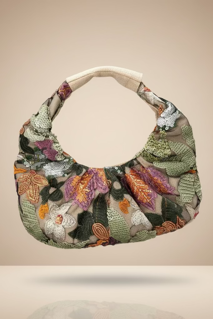 CARTERA DISEÑO EN FLORES EN LENTEJUELAS ROSAS Y VERDE