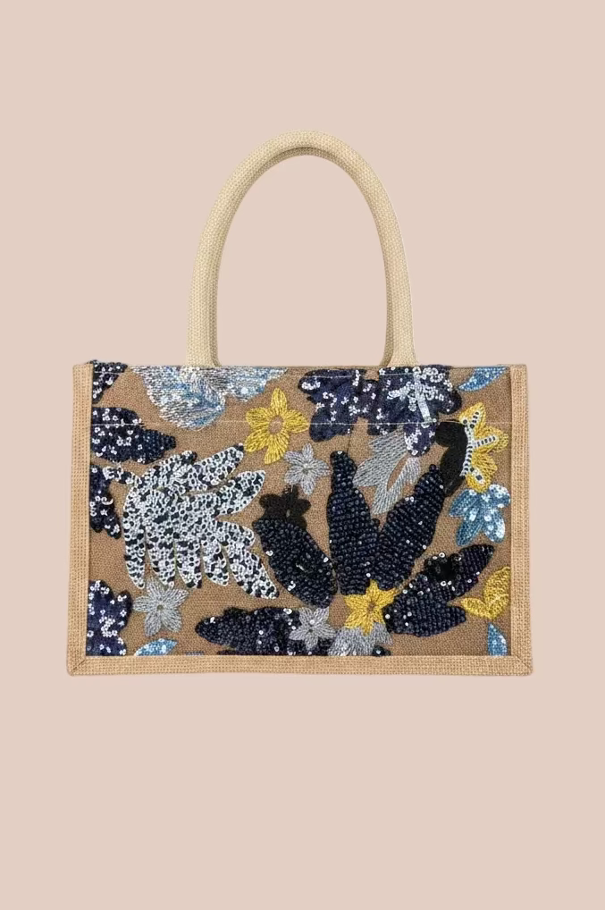 CARTERA CON DISEÑOS EN LENTEJUELAS FLORES AZULES
