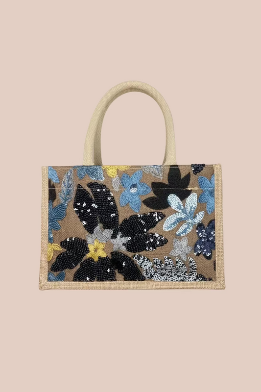 CARTERA CON DISEÑOS EN LENTEJUELAS FLORES AZULES