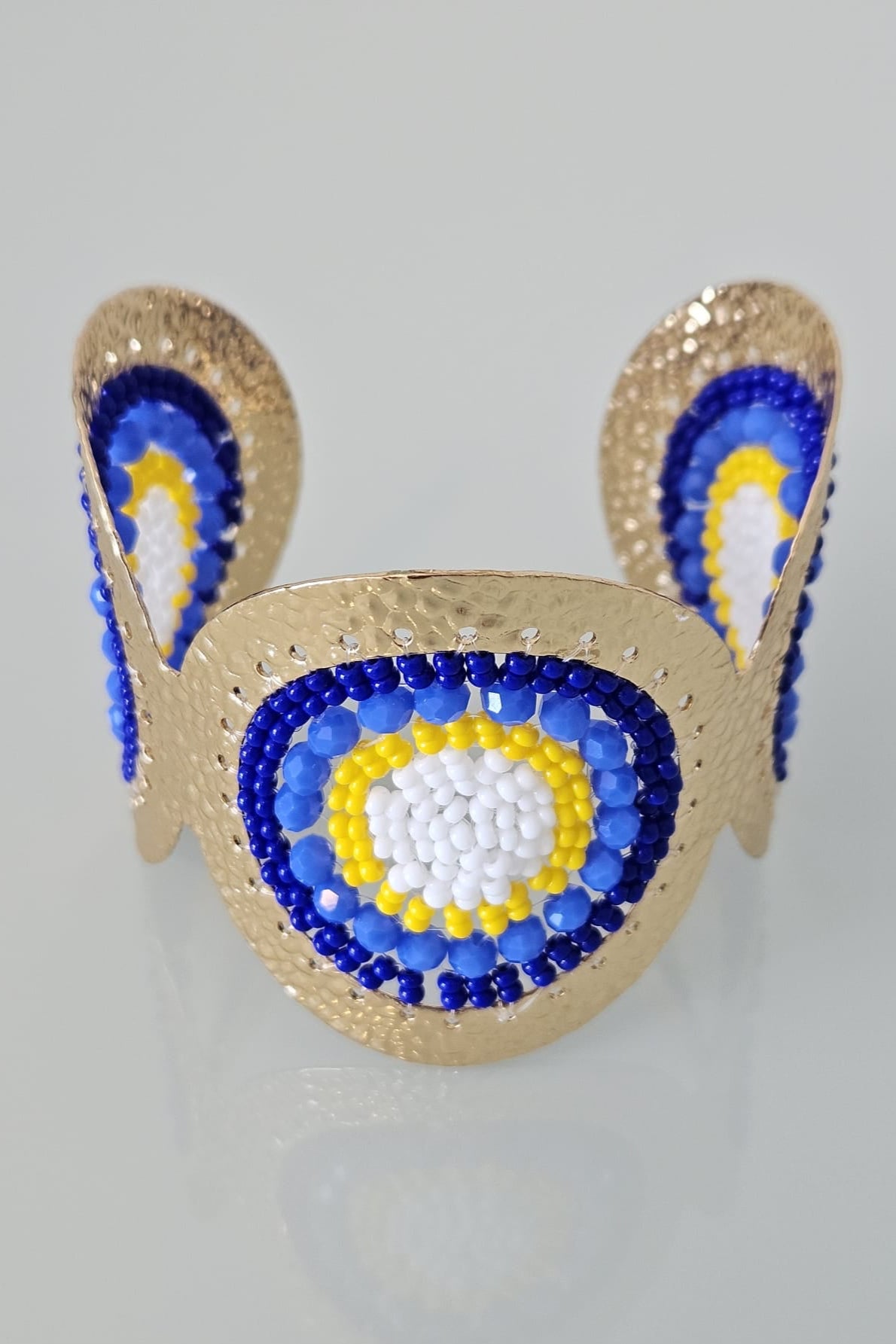 GOLD BRACELET AND EARRING SET WITH BLUE, YELLOW AND WHITE
