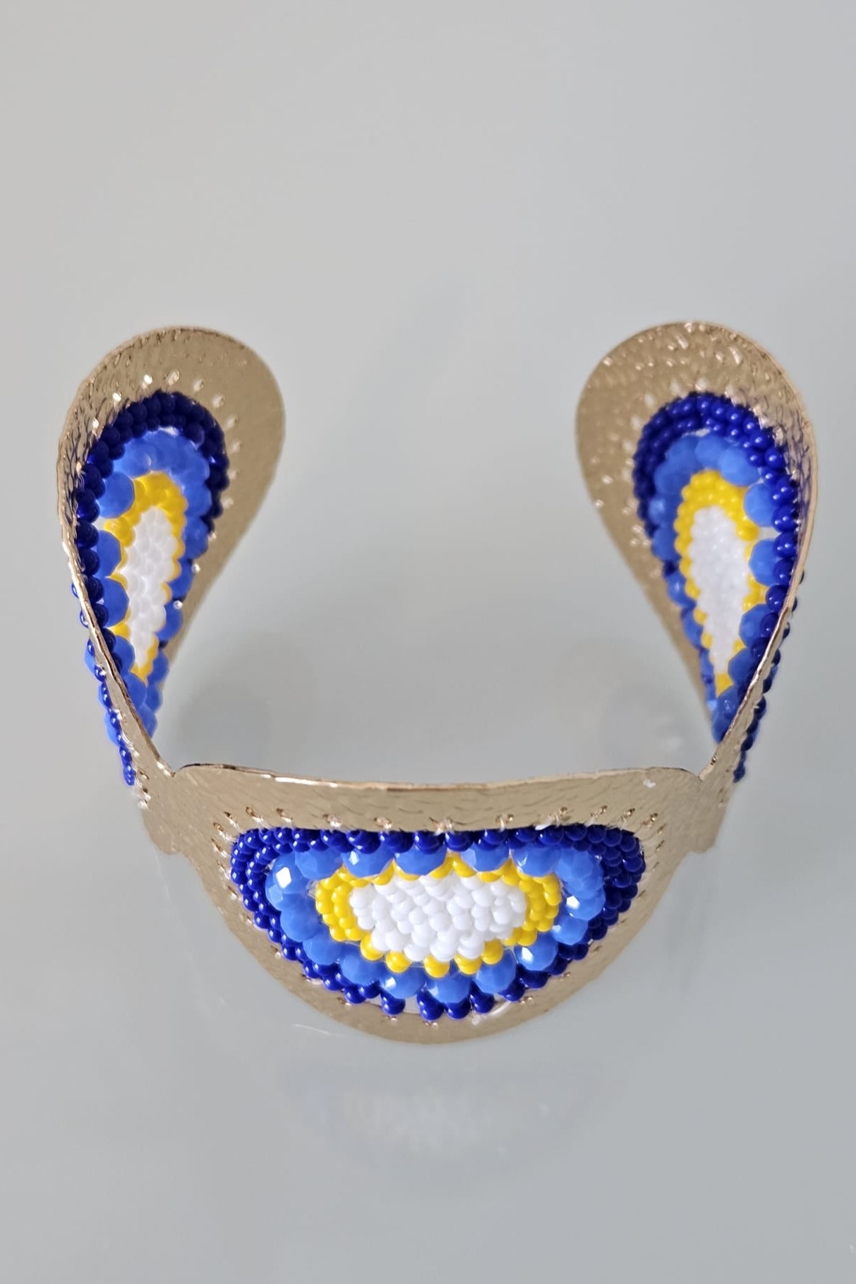 GOLD BRACELET AND EARRING SET WITH BLUE, YELLOW AND WHITE