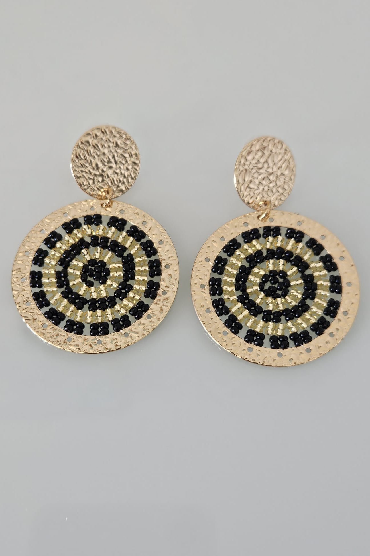 SET DE PULSERA TRENZADA Y ARETES NEGRO Y DORADO