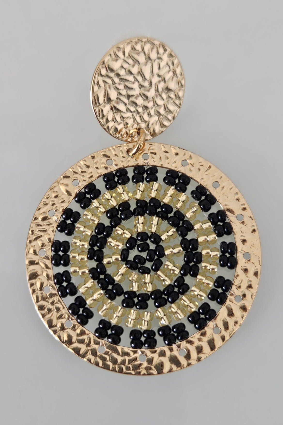 SET DE PULSERA TRENZADA Y ARETES NEGRO Y DORADO