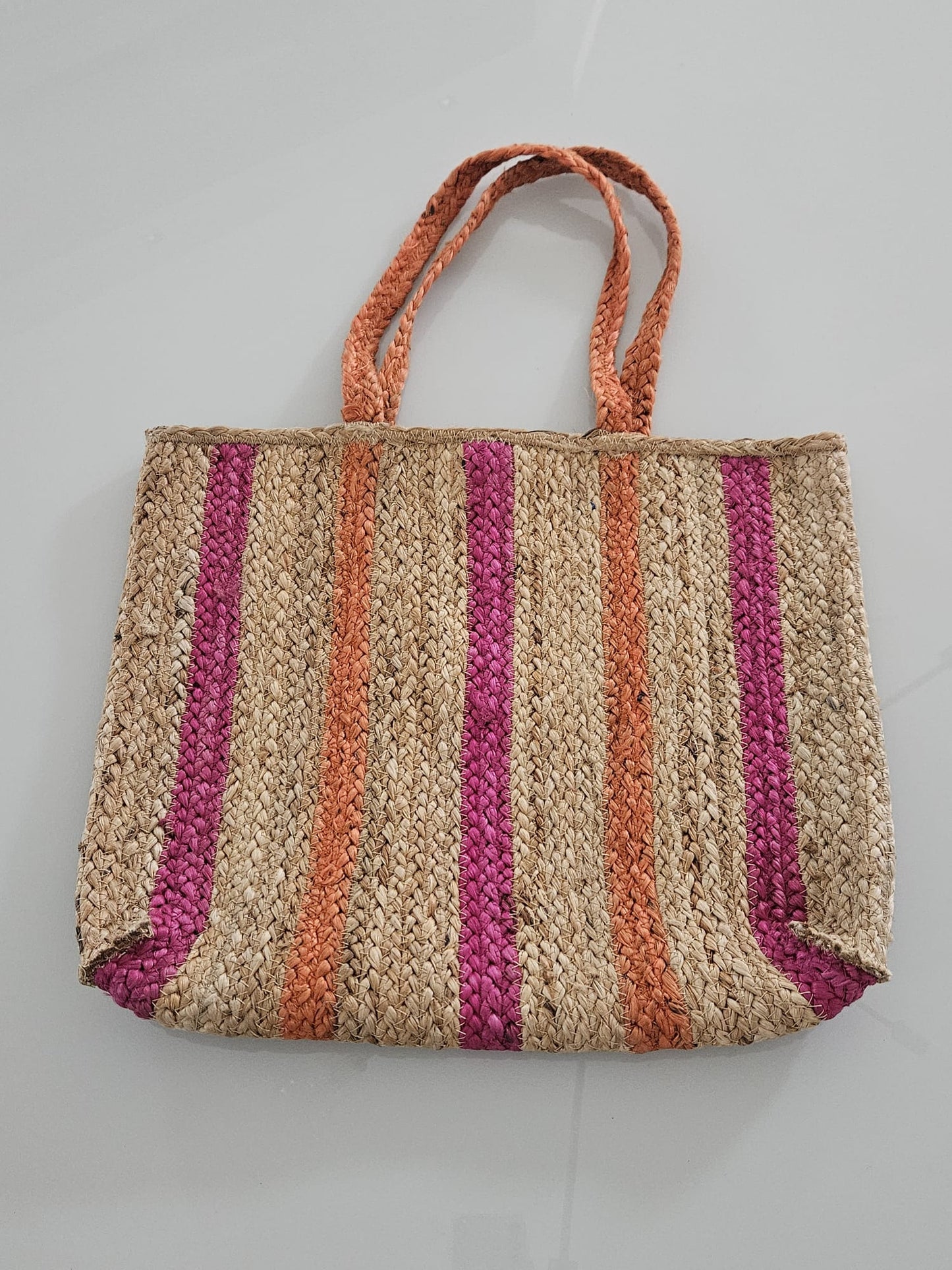 CARTERA EN PAJA CREMA, NARANJA Y FUCSIA