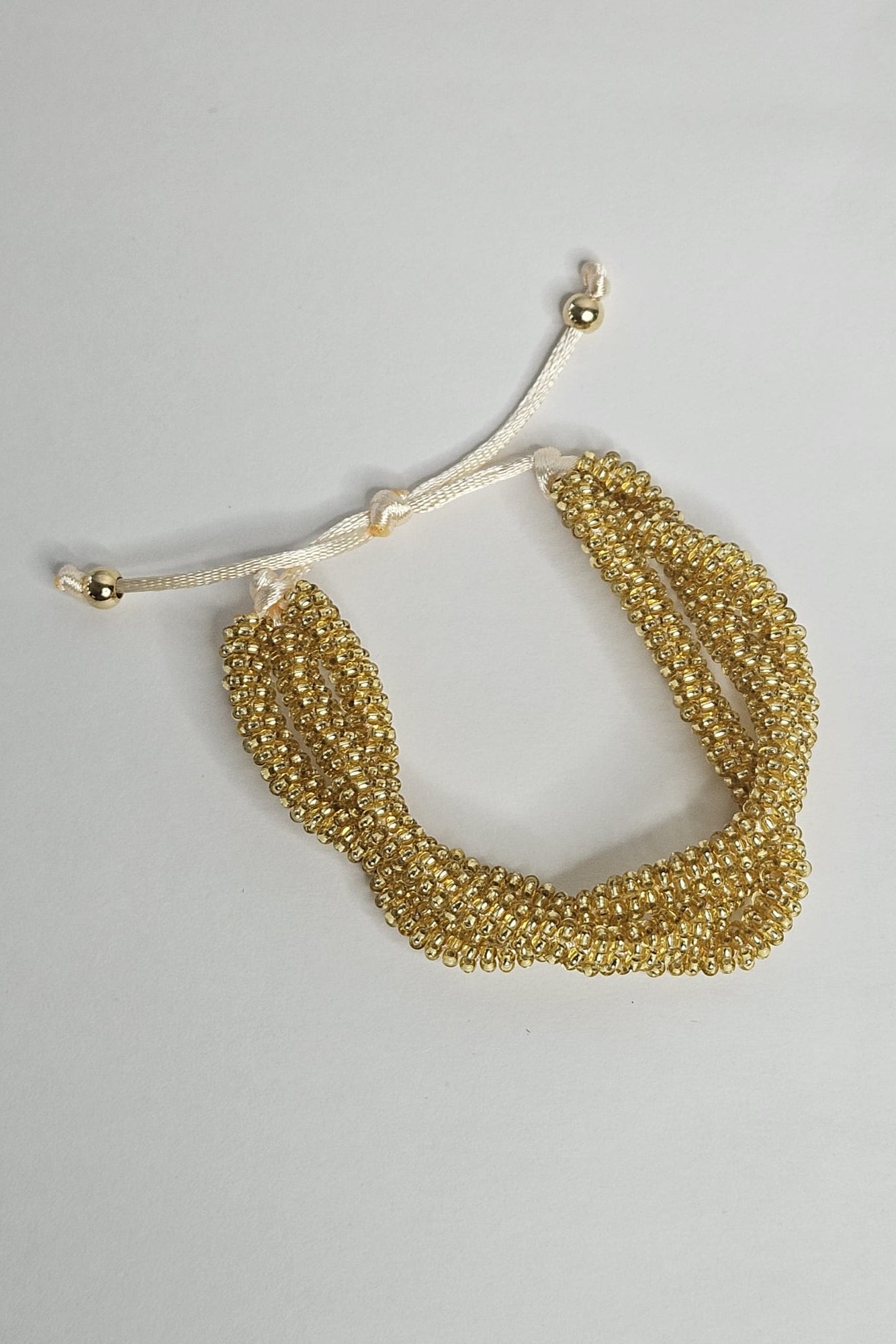 GOLD BRAIDED BRACELET AND EARRINGS SET