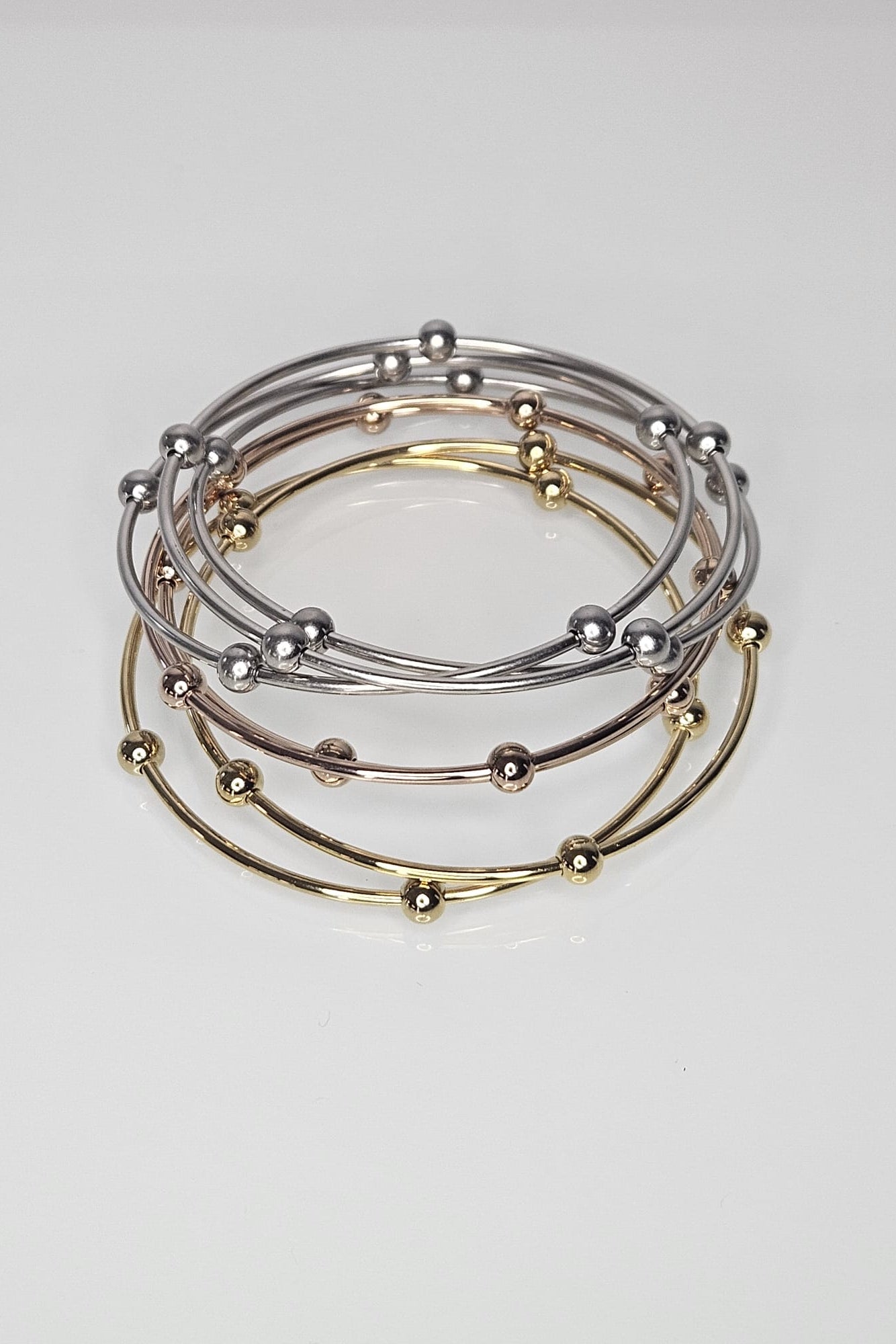 PULSERAS "BANGLES" TRICOLOR CON ESFERAS