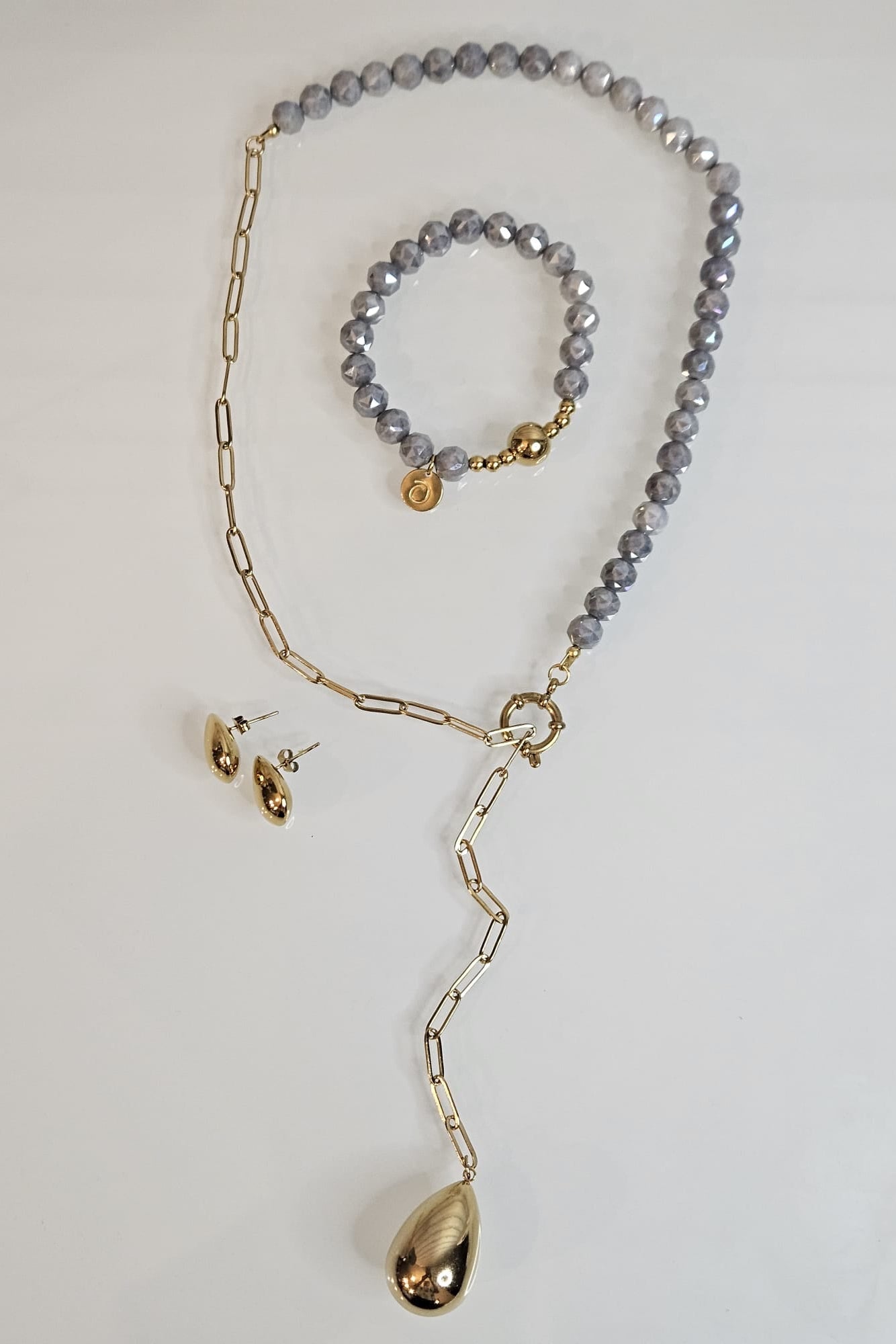 SET COLLAR, PULSERA Y PANTALLAS DORADO CON CRISTAL GRIS