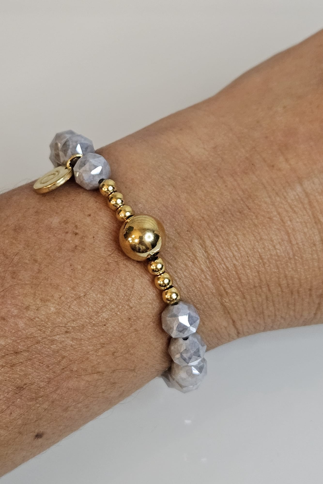 SET COLLAR, PULSERA Y PANTALLAS DORADO CON CRISTAL GRIS