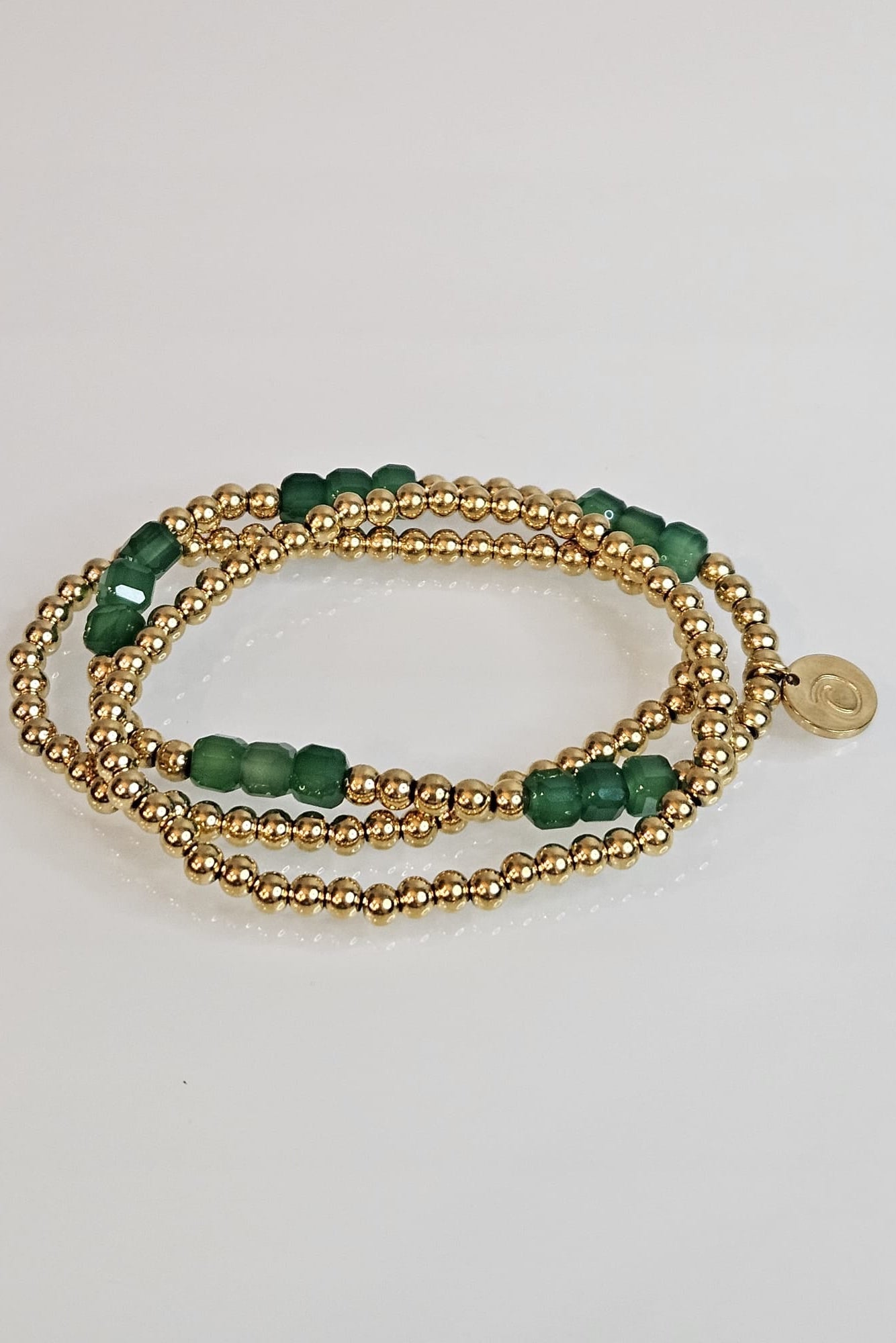 SET DE 3 PULSERAS ELÁSTICAS DORADAS Y VERDE