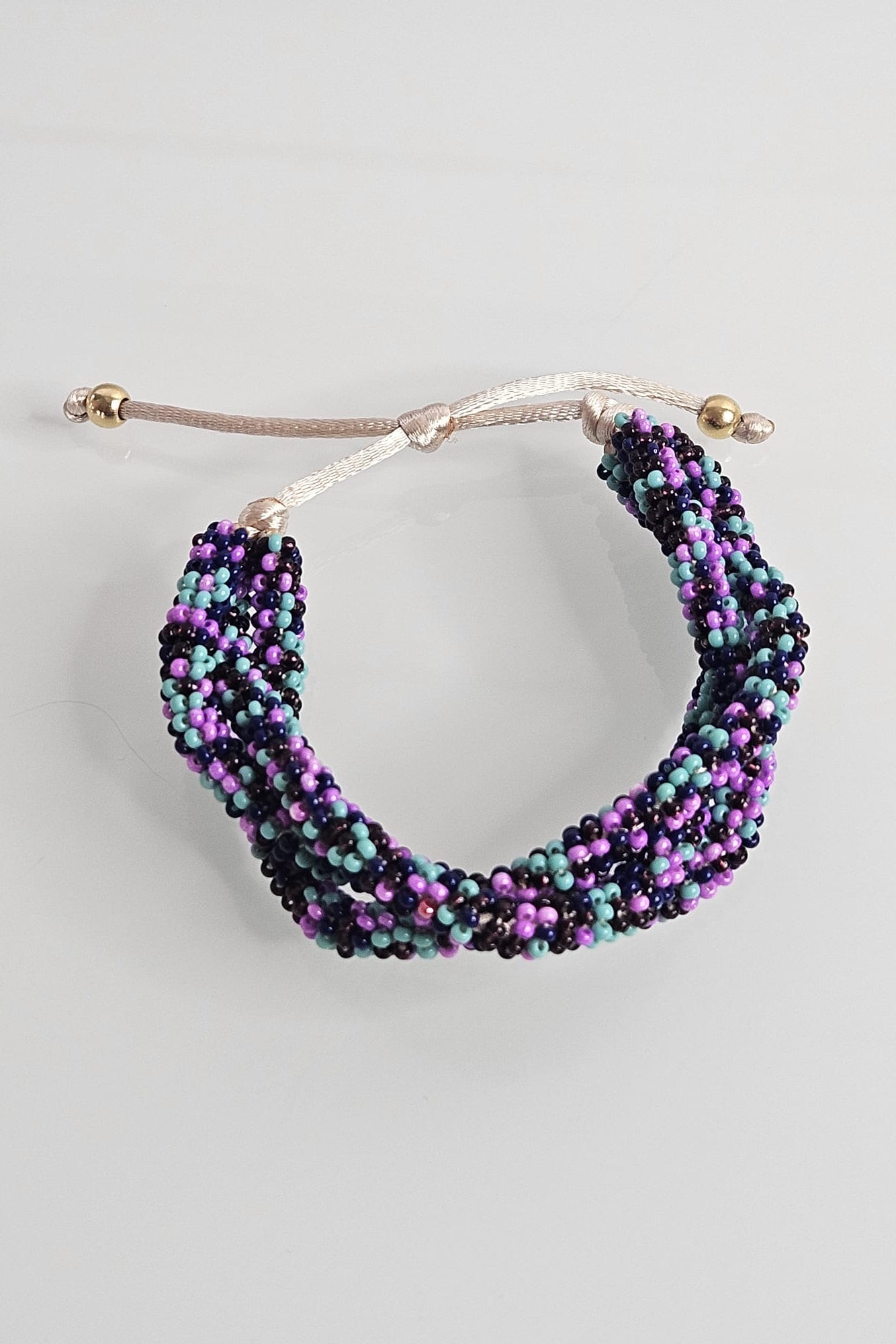 SET DE PULSERA TRENZADA Y ARETES MULTICOLOR VIOLETA