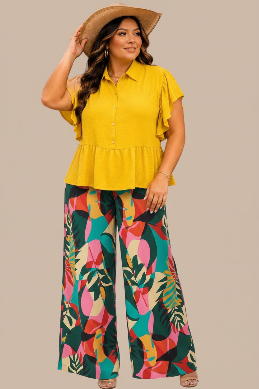 Modelo talla plus con blusa mostaza y pantalón estampado