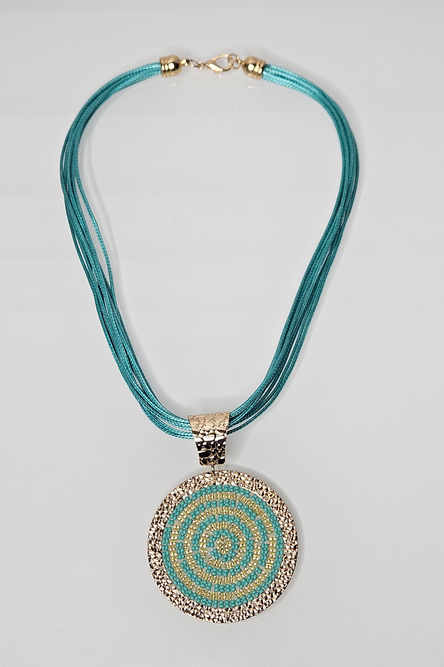 COLLAR TURQUESA Y DORADO